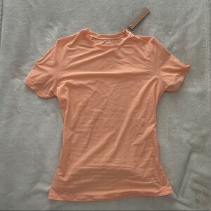 Brand new with tags!!! Small Skims fits everybody t-shirt in faded nectar